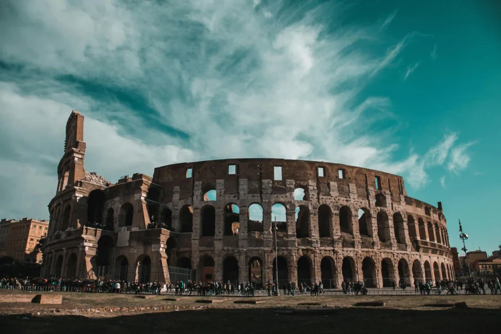 a large stone building with many arches Colosseum